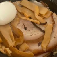 Tonkotsu Ramen · Roast pork, bamboo shoot, egg, black fungus, green onion.