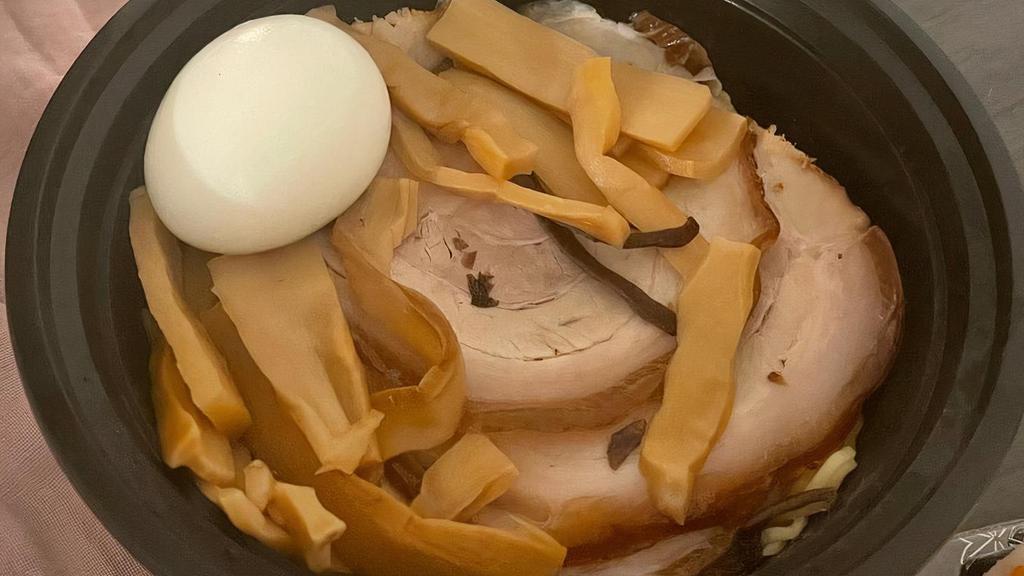 Tonkotsu Ramen · Roast pork, bamboo shoot, egg, black fungus, green onion.