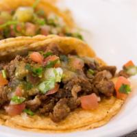 Regular Taco · Corn tortilla with your choice of meat, salsa, ranchera, and chili.