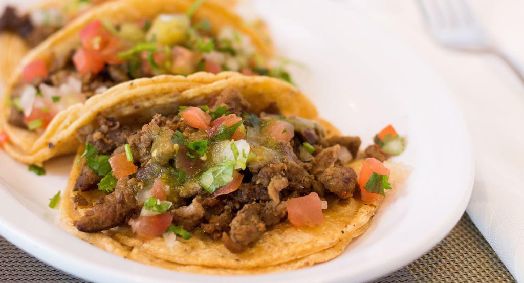 Regular Taco · Corn tortilla with your choice of meat, salsa, ranchera, and chili.