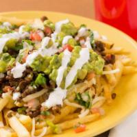 Asada Fries · Served with french fries, cheese, steak, guacamole and salsa ranchera.