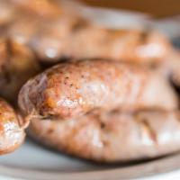 Hot Links · Spiced pork link sausage with a mild kick! Yee haw!