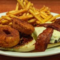 The Texas Outlaw Burger · All-natural bourbon whiskey glaze, pepper-jack cheese, applewood smoked bacon and haystack o...