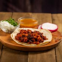 Chorizo Tacos · Chorizo, onion, cilantro and tomatillo salsa.