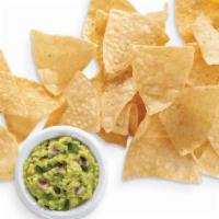 Chips & Guacamole · Corn chips with side of guacamole.