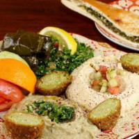 1. Mediterranean · Hummus, babaghanoush, tabouli, feta, 2 falafel, 3 dolmas, 1/2 spinach pie, olives, tomatoes,...
