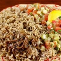 3. Mojadara · Hot lentil & rice with caramelized onions, choice of arabic salad or yogurt cucumber salad &...