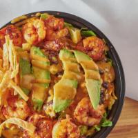 Chipotle Shrimp Salad · Grilled shrimp, romaine lettuce, avocado, beans and corn mix, salsa, cheese, tortilla strips...