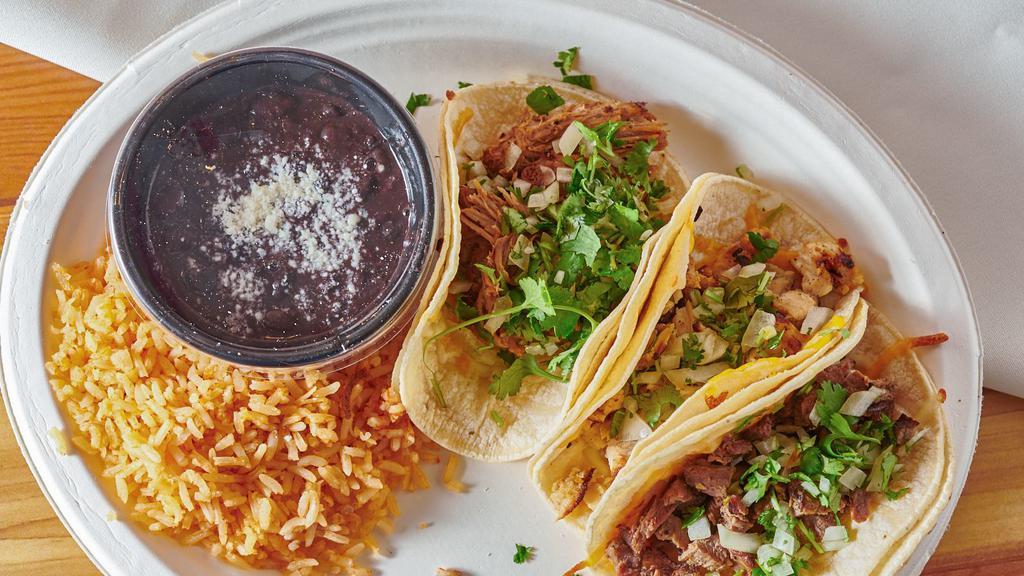 Mexico City Taco · Three chicken, steak, or carnitas tacos. Served with salsa Mexicana, rice, beans and chips & salsa.