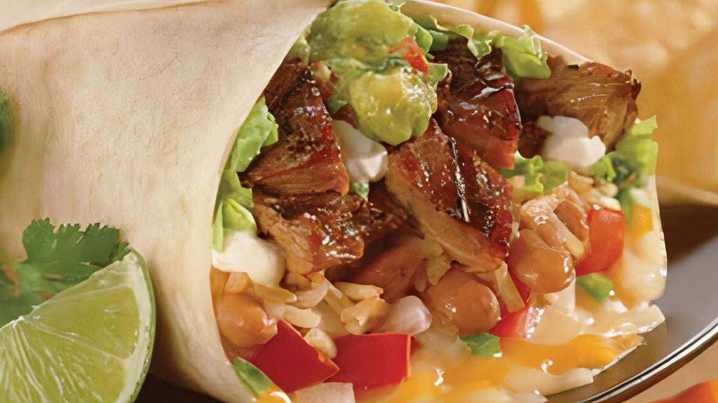 Grande Burrito · Grilled chicken, steak or carnitas, rice, beans, jack and cheddar cheeses, salsa Mexicana, guacamole (made fresh hourly from real & fresh Avocados), lettuce and sour cream wrapped in a flour tortilla.