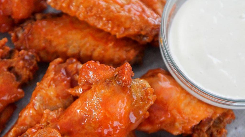 Buffalo Wings · Unbreaded chicken wings section coated in Buffalo sauce. Oven baked.
Dipping Sauce: Ranch, Blue Cheese, Honey Mustard, Marinara,  Mayonnaise, BBQ
