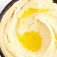 Hummus ​(8 oz) With Pita · A thick spread made from mashed chickpeas, tahini, lime juice, garlic and olive oil. Served ...