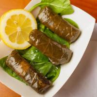 Dolmas · Grape leaves filled with a mixture of rice & onions.
