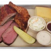 Sampler Plate | BBQ Plate · Pick 3 of our Smoke & Fire proteins, served with your choice of sides, sauces, and pickle or...