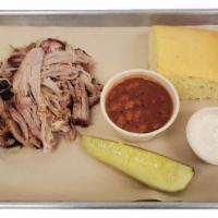 Pulled Pork Plate | BBQ Plate · 8oz of pulled pork, served with your choice of sides, sauce, and pickle or jalapeño.
