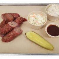 Smoked Sausage Plate | BBQ Plates · Your choice between 2 sausages, served with your choice of sides, sauce, and pickle or jalap...