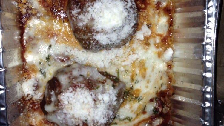 Baked Meatballs (2 Pieces) · With marinara sauce and mozzarella cheese.