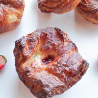 The Queen's Crown · The Queen's Crown is our Kouign Amann pastry filled with house made strawberry jam