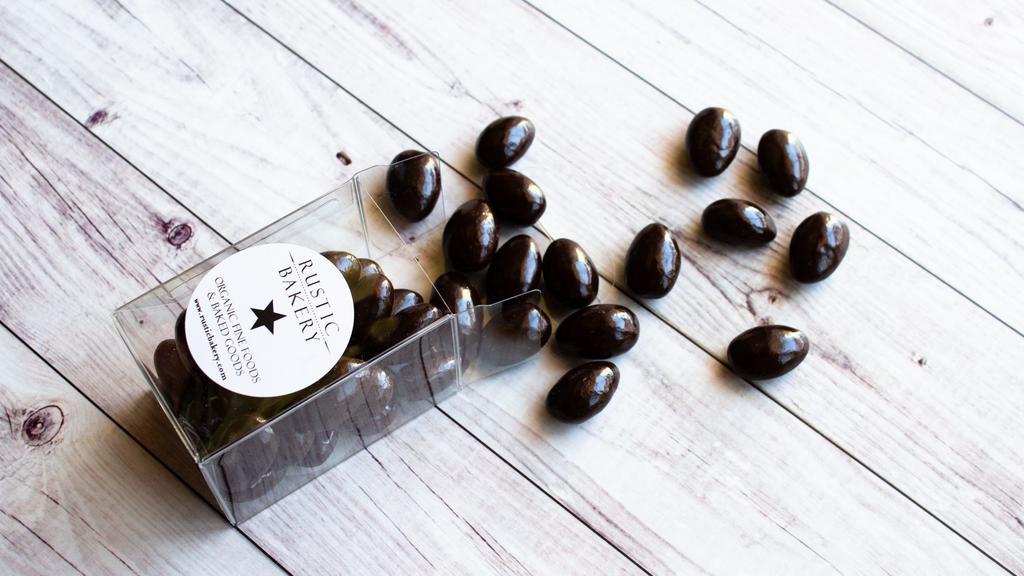 Dark Chocolate Covered Almonds · 4.5 oz of whole deluxe California almonds that are drenched in 72% bittersweet chocolate.    Kosher