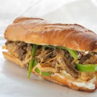 Mexican Cheesesteak · Ribeye steak grilled served on a soft roll with mushrooms, avocado, jalapeño, and pepper Jac...