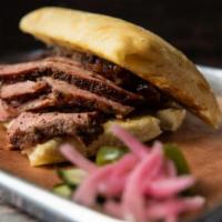 Regular Tri Tip · Hand cut smoked tri-tip. Served with your choice of side.