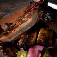 Half Rack Ribs · St Louis style pork ribs with our original BBQ sauce