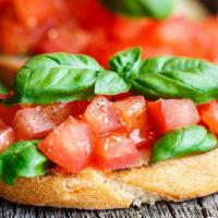 Bruschetta · Grilled bread, fresh tomatoes, garlic, basil.
