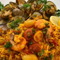 Risotto di Mare · Saffron Risotto with clams, mussels, prawns and calamari with a hint of lemon