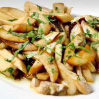 Tris Di Funghi · Sauteed three mushrooms with garlic, pepperoncino, and fresh chopped parsley.