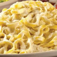 Fettuccine Alfredo · Classic favorite featuring fettuccine tossed with our creamy homemade Alfredo sauce . {VT}