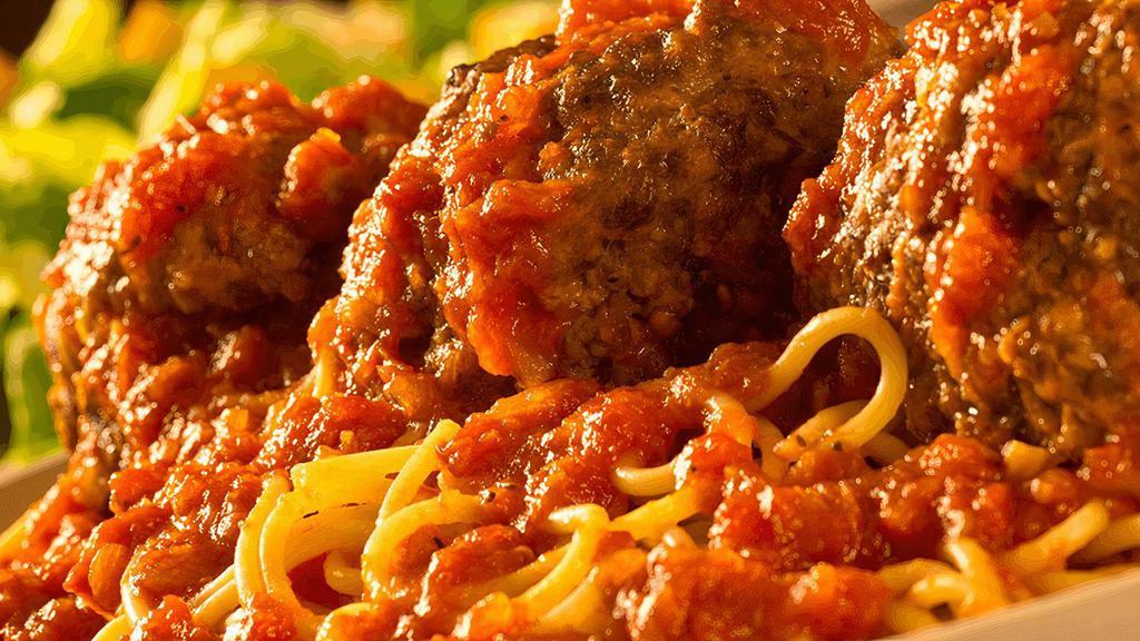 Spaghetti With Meatballs · Our famous half-pound meatballs with our homemade marinara sauce . {B}