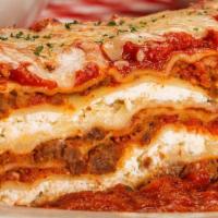 Lasagna · Towering layers of meat sauce, ricotta, mozzarella, provolone & parmesan . {B}