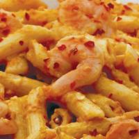 Shrimp Fra Diavolo · garlic shrimp & crushed red pepper with penne in spicy rosa sauce.