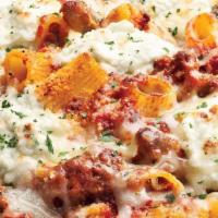 Baked Rigatoni · Spicy Italian sausage & meat sauce tossed & topped with mozzarella, parmesan & ricotta {SP}
