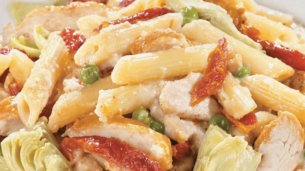 Penne San Remo · Chicken breast, artichoke hearts, sun-dried tomatoes & peas in white wine cream sauce