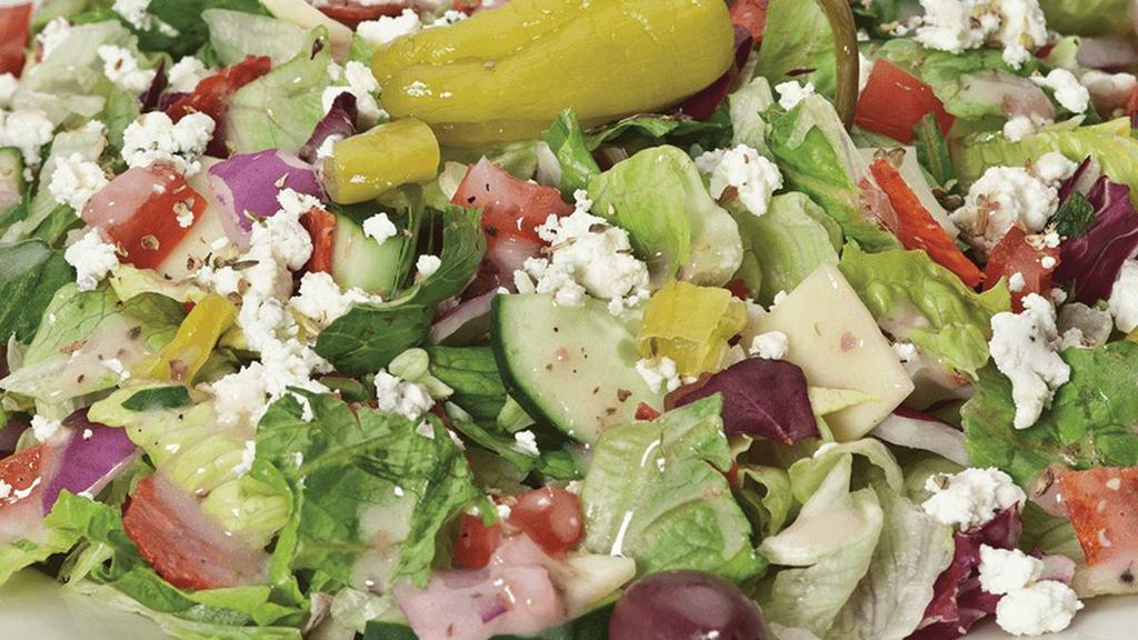 Chopped Antipasti · Pepperoni, salami, red onions, pepperoncini, cucumbers, Roma tomatoes, black & green olives, provolone, feta and Gorgonzola with mixed lettuce in our signature Italian vinaigrette {GF}