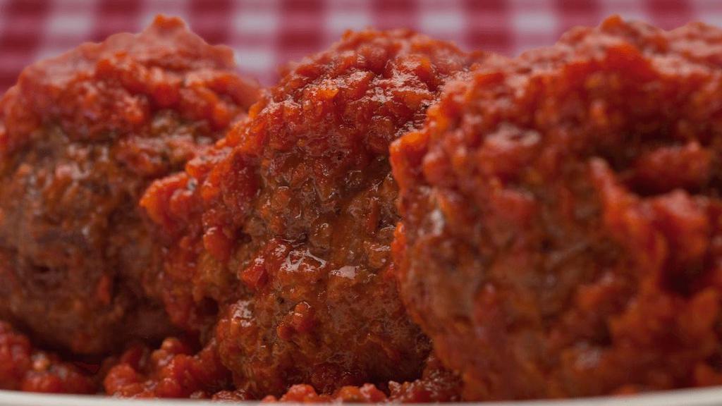 Meatball (3) · . Our famous half-pound, mouth-watering meatball made with 100% premium ground beef served with our homemade marinara sauce