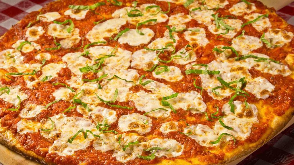 Margherita · Fresh mozzarella, fresh basil & our authentic pizza sauce  . {VT}