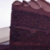 Double Dark Chocolate Cake · Moist dark chocolate cake with layers of rich chocolate frosting on top of our sinful chocol...