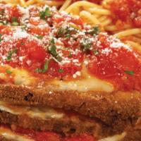 Eggplant Parmigiana · topped with our homemade marinara sauce, Roma tomatoes, basil & mozzarella served with a sid...
