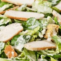 Chicken Caesar · Romaine hearts tossed in our signature Caesar dressing with roasted garlic croutons & parmes...