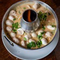Tom Kha (Small) · Spicy coconut soup seasoned with galangal root, lemongrass, lemon leaf flavored with lime ju...