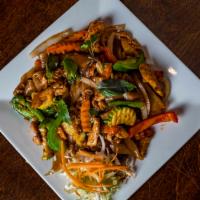 Drunken Noodles · Pan-fried flat rice noodles with egg, onions, green bean, zucchini, carrots, bell peppers, T...