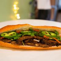 BM1. House Special · Bánh Mì Thịt Nướng. Charcoal-grilled pork in a Vietnamese style baguette.