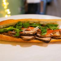 BM9. Wood-Smoked Pork Belly · Wood-smoked pork belly with barbecue sauce in a Vietnamese style baguette.