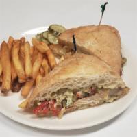 Grilled Chicken · With sauteed peppers, onions and pesto aioli.