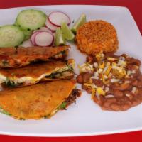 Three (3) Quesa Taco Plate with Rice & Beans · Try our quesabirria a delicious trendy cross between a dorado-style grilled taco and a Frenc...