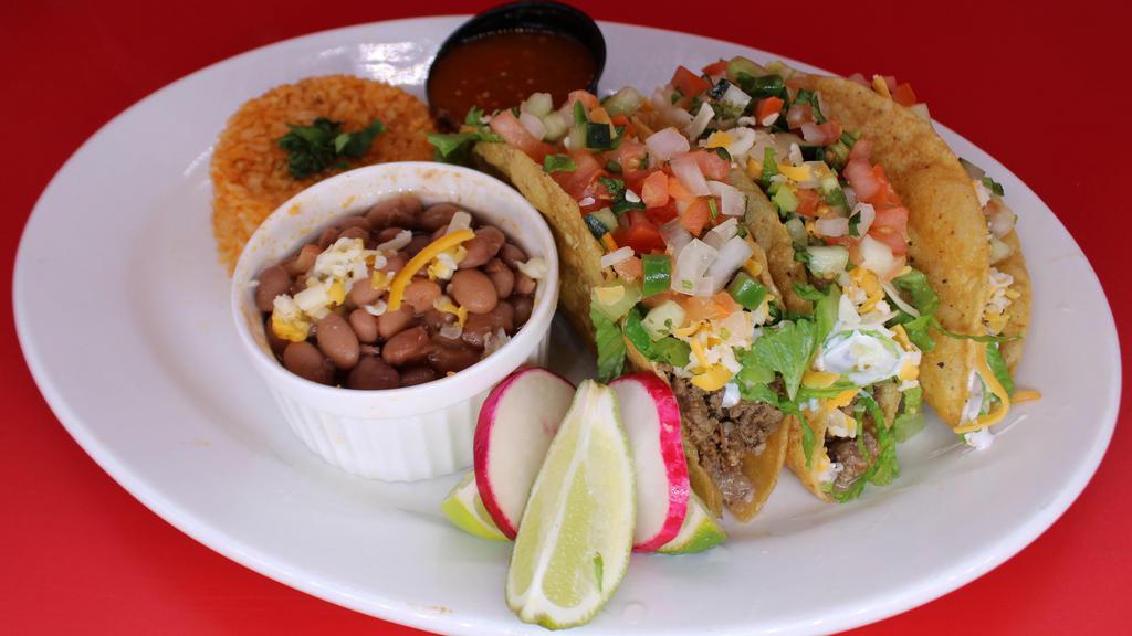 Three (3) Super Crispy Tacos Plate with Rice & Beans · Our crispy tacos are made with your choice of meat topped with shredded lettuce, cheese, sour cream, and pico de gallo with a side of rice and beans.