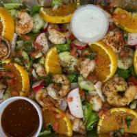 Botana de Camarones · Looking to try something new, give our botana de camarones a try, grilled shrimp over a bed ...