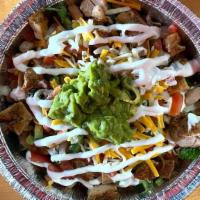 Chicken Super Burrito Bowl · Our version of the naked burrito in a bowl. The meat of choice, rice, beans, cheese, sour cr...